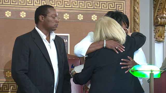 St. Louis Mayor Lyda Krewson hugs Annie Smith, mother of Anthony Lamar Smith, after a resolution was passed in Anthony's memory (Credit: KMOV)
