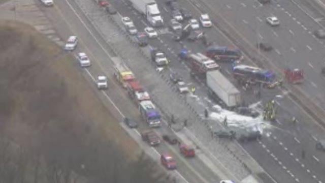 Overturned tractor-trailer shuts down 2 lanes on I-85