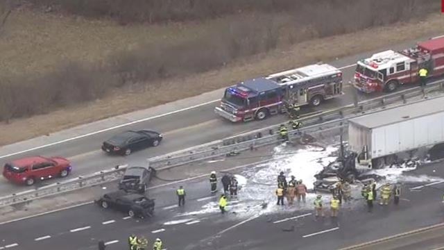 Overturned tractor-trailer shuts down 2 lanes on I-85