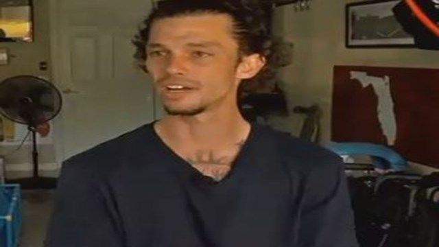 A driver slammed into a motorcyclist during a road rage incident in Florida Sunday. (Credit: CNN)