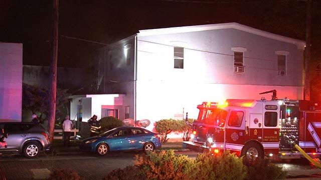Firefighters outside an apartment complex on North High Street in Belleville (Credit: KMOV)
